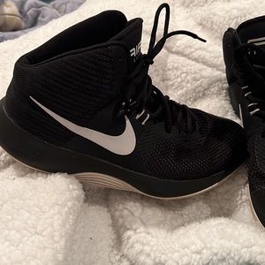 Nike Air Precision basketball shoes.